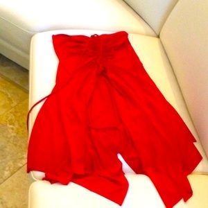 - Strapless red dress size large with handkerchief hemline